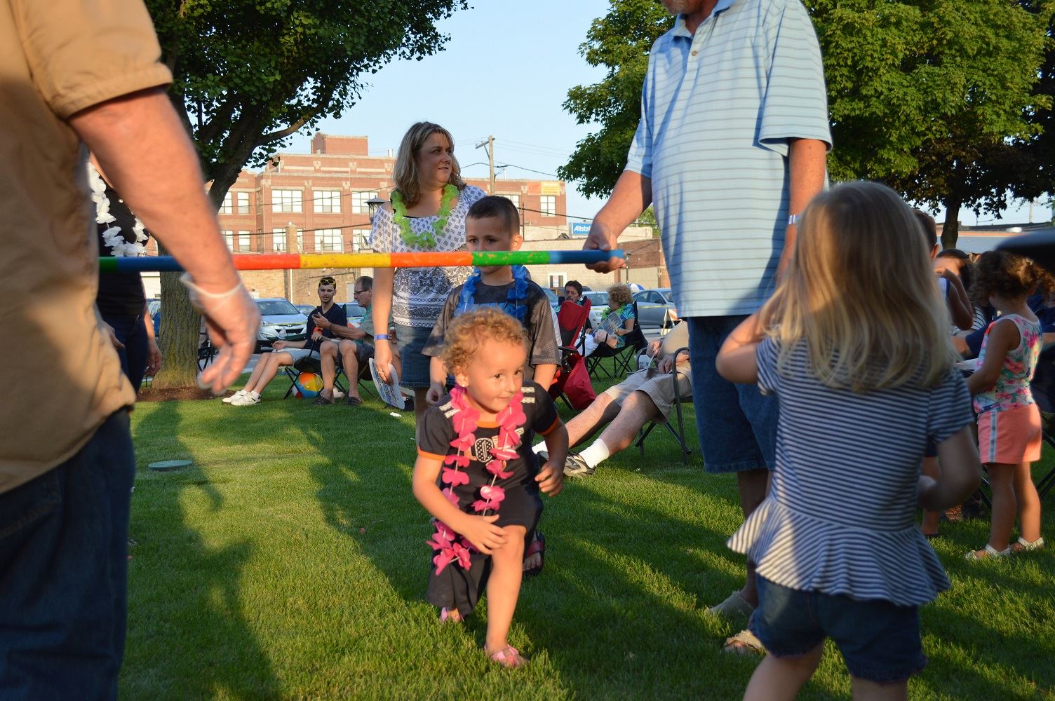 Kids limbo during the Mr. Meyers concert at Cortesi Veterans Memorial Park on Aug. 4, 2016.